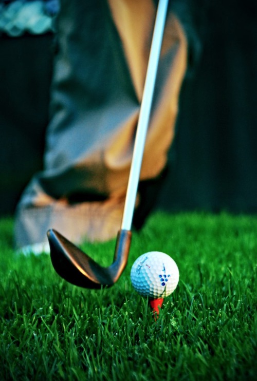 Closeup of golf ball on a tee